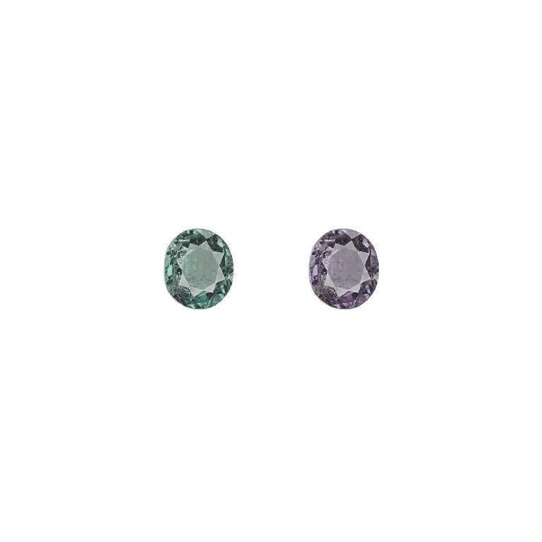 Round alexandrite gemstones, green and purple