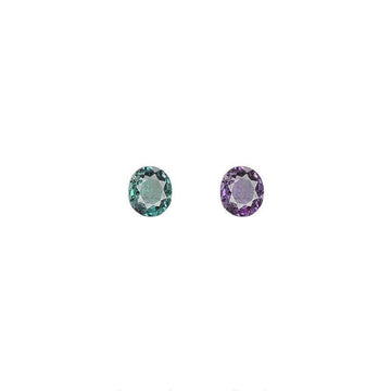 Oval alexandrite gemstones in teal green and purple
