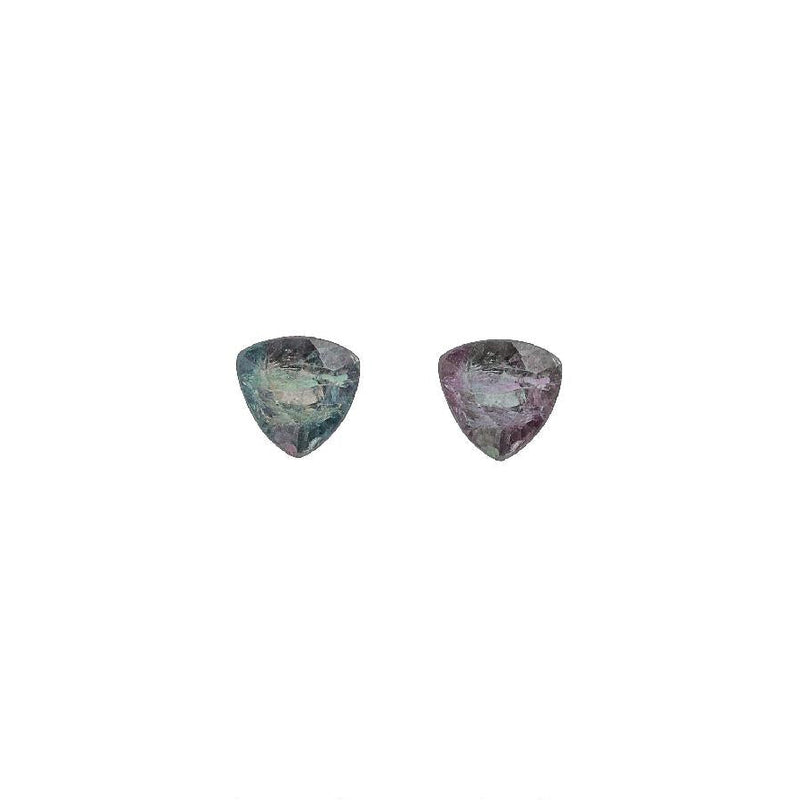 Pair of oval-cut alexandrite gemstones with triangular faceted tops