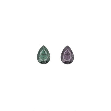 Loose pear-cut alexandrite stones, one green and one purple