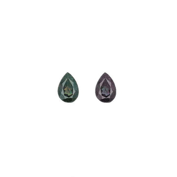 Pair of pear-cut alexandrite gemstones, one green and one purple