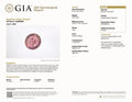 GIA report page with oval pinkish orange padparadscha sapphire photo and details