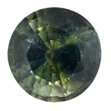 Round faceted teal sapphire gemstone with dark green-blue glossy facets