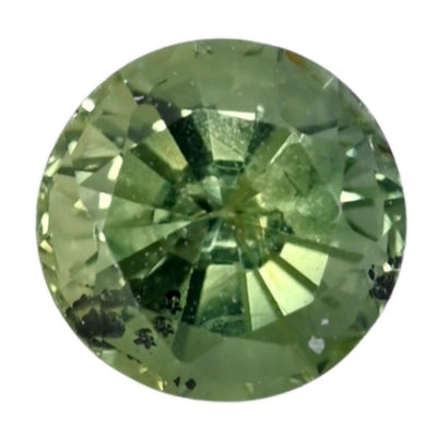 Oval teal sapphire gemstone, faceted cut