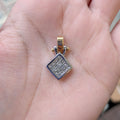 Two-tone gold square diamond pendant with bright diamond grid and polished top bail.
