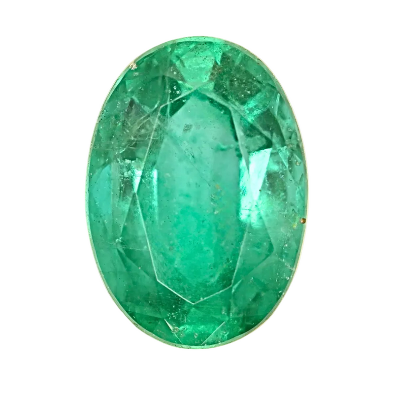 Oval green emerald-cut gemstone with faceted surface
