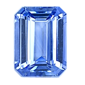 Blue sapphire gemstone in emerald-cut octagon with step facets, vivid blue