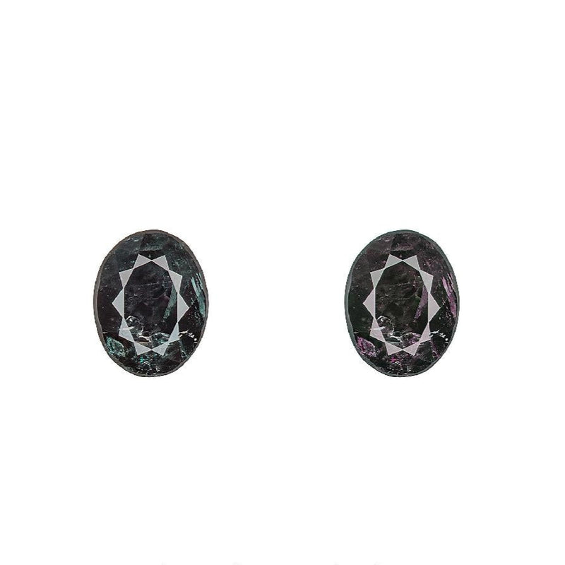 Oval alexandrite gemstones, dark greenish purple, faceted, two-stone pair