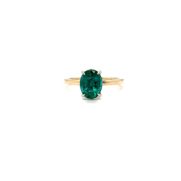 14k yellow gold ring with oval green emerald-cut gemstone, prong-set