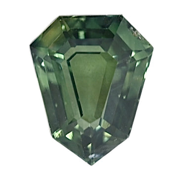 Emerald-cut teal sapphire gemstone with faceted octagonal shape