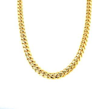 Gold Miami Cuban chain necklace with twisted links, close-up