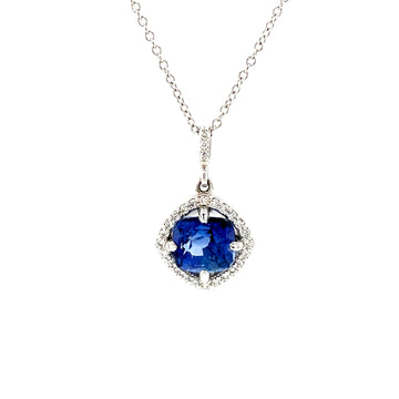 Sapphire pendant necklace with oval blue gemstone in diamond halo, 14k white gold chain