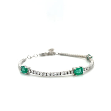Emerald and diamond tennis bracelet, 14k white gold, clasp and green gemstone accents