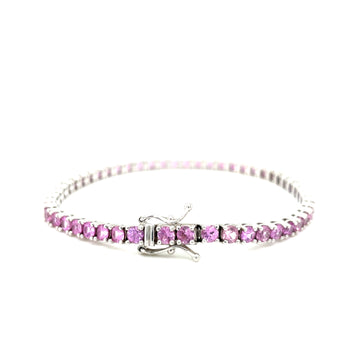 Silver-tone tennis bracelet with round pink sapphire stones, hinged clasp