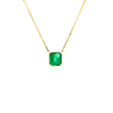 14k yellow gold emerald pendant with large square emerald-cut gemstone on chain