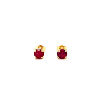 14k yellow gold ruby stud earrings with round red gemstones in prong settings