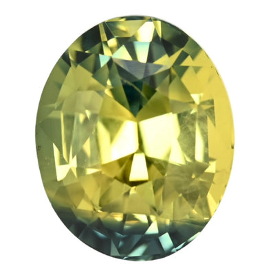 Faceted oval bi-color sapphire, yellow and green tones
