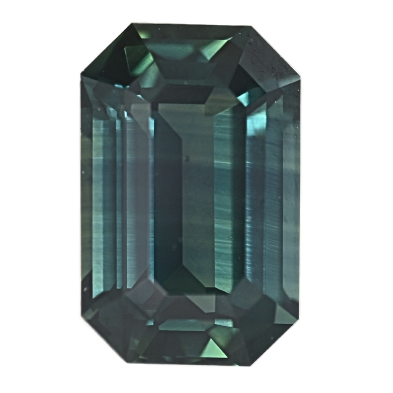 Teal sapphire with emerald-cut facets, rectangular octagonal shape