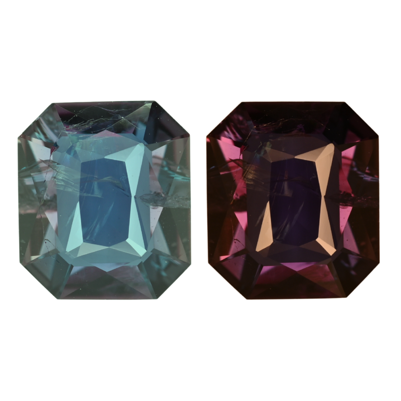 Octagon-cut alexandrite gemstones, one blue-green and one purple, close-up pair
