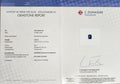 Gemstone report document for sapphire, with certification stamp and signature