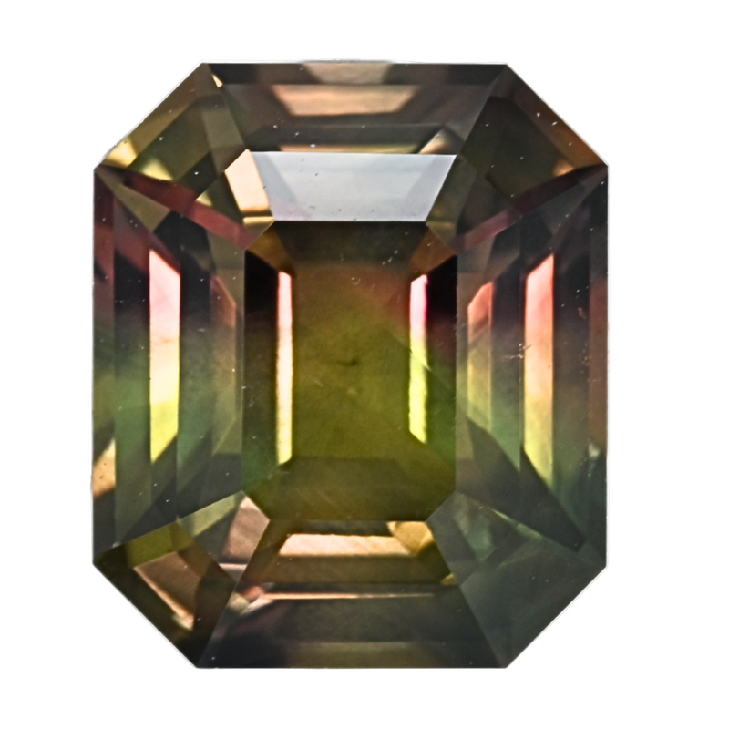 Emerald-cut bi-color sapphire gemstone, faceted dark green and purple