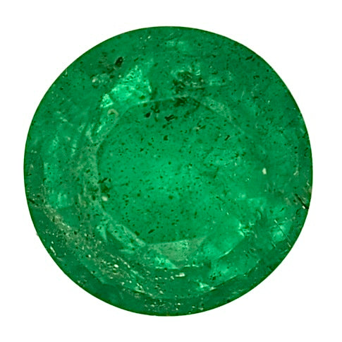 Green faceted emerald gemstone, oval cut with bright flashes