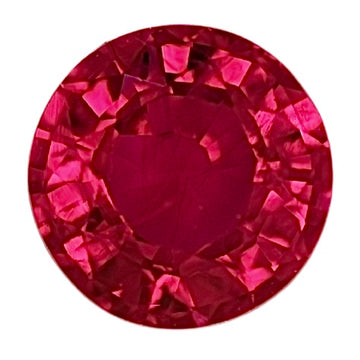 Round ruby gemstone, bright pink-red facets