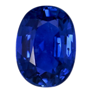 Oval blue sapphire gemstone with faceted reflective cut