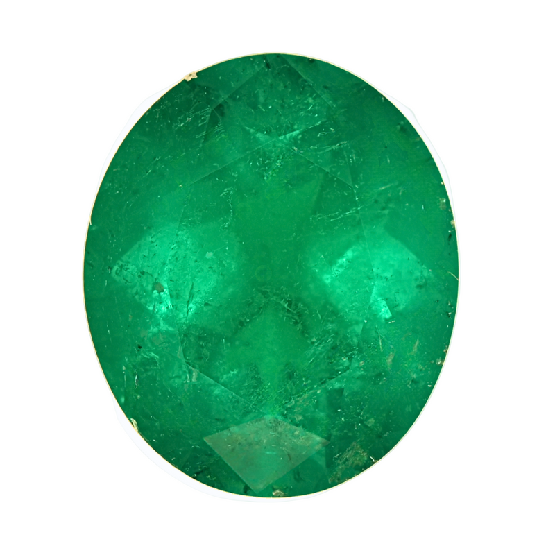 Oval faceted green emerald gemstone, loose