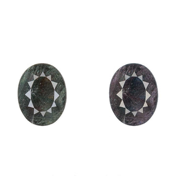 Oval alexandrite gemstone, dark green and dark purple, side-by-side close-up