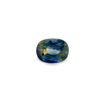 Oval teal and blue bi-color sapphire gemstone, faceted