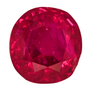Round ruby gemstone, vivid red magenta with faceted surface