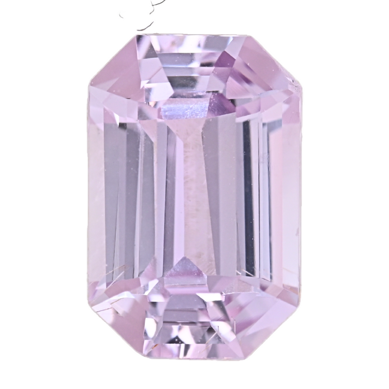 Close-up of light pink emerald-cut sapphire gemstone facets