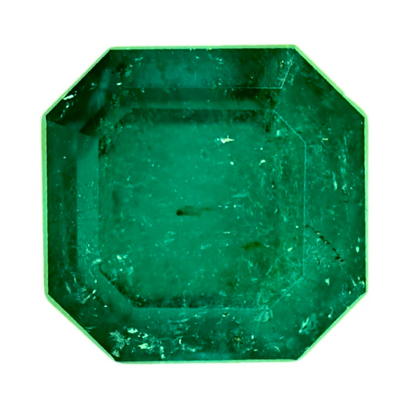 Octagon-cut green emerald gemstone, faceted and glossy