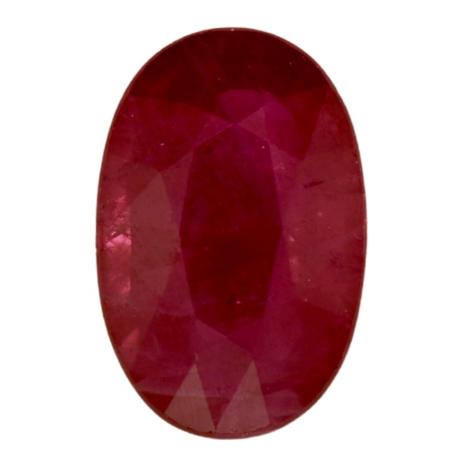 Oval red ruby gemstone with faceted surface