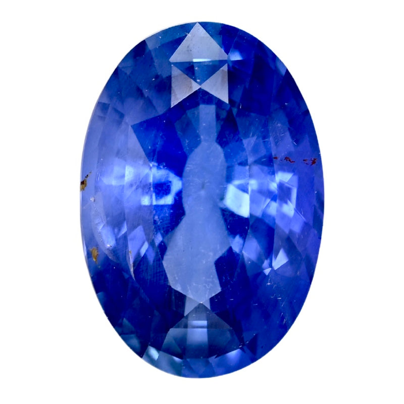 Oval blue sapphire gemstone, faceted, polished surface