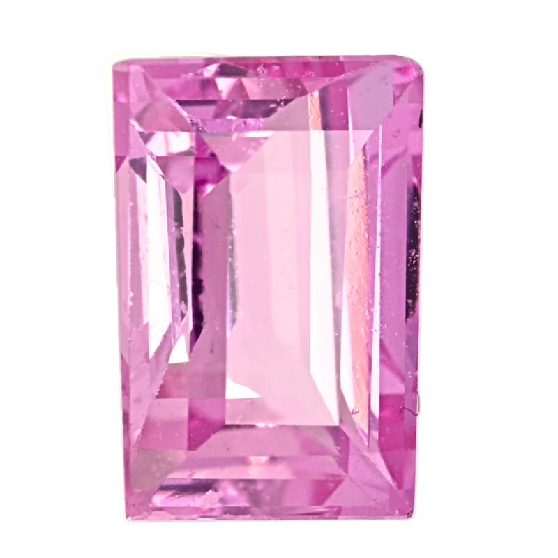 Emerald-cut pink sapphire gemstone close-up