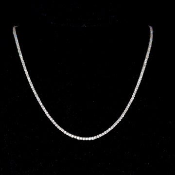 Diamond tennis necklace with continuous round stones, full loop on white-gold tone