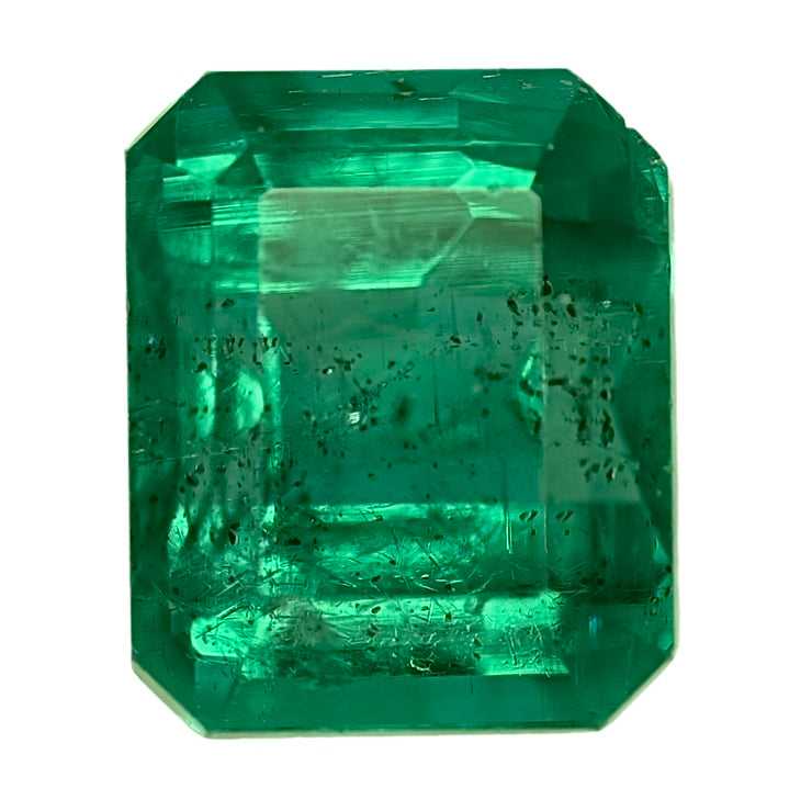Emerald-cut green gemstone with rectangular step facets
