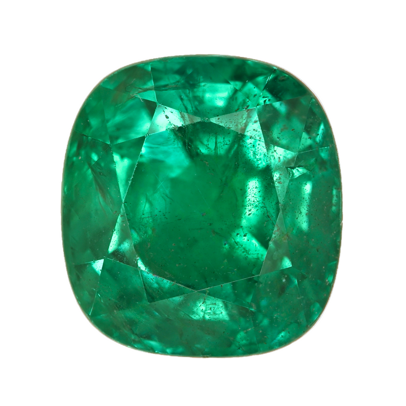 Faceted cushion-cut green emerald gemstone
