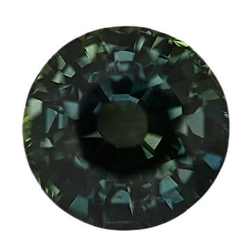 Round dark green sapphire gemstone with faceted cut