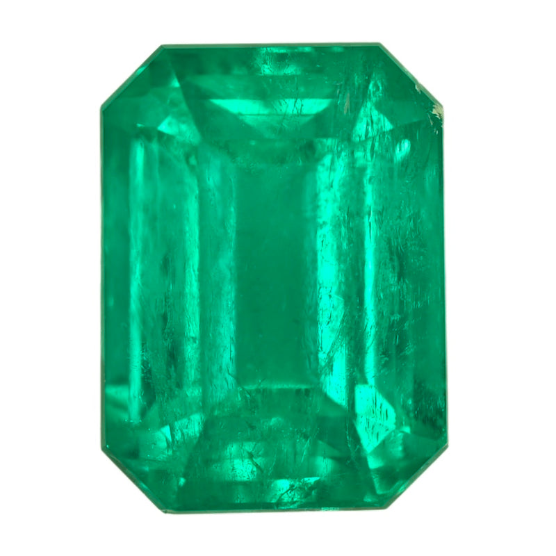Large octagonal green emerald gemstone close-up with visible facets