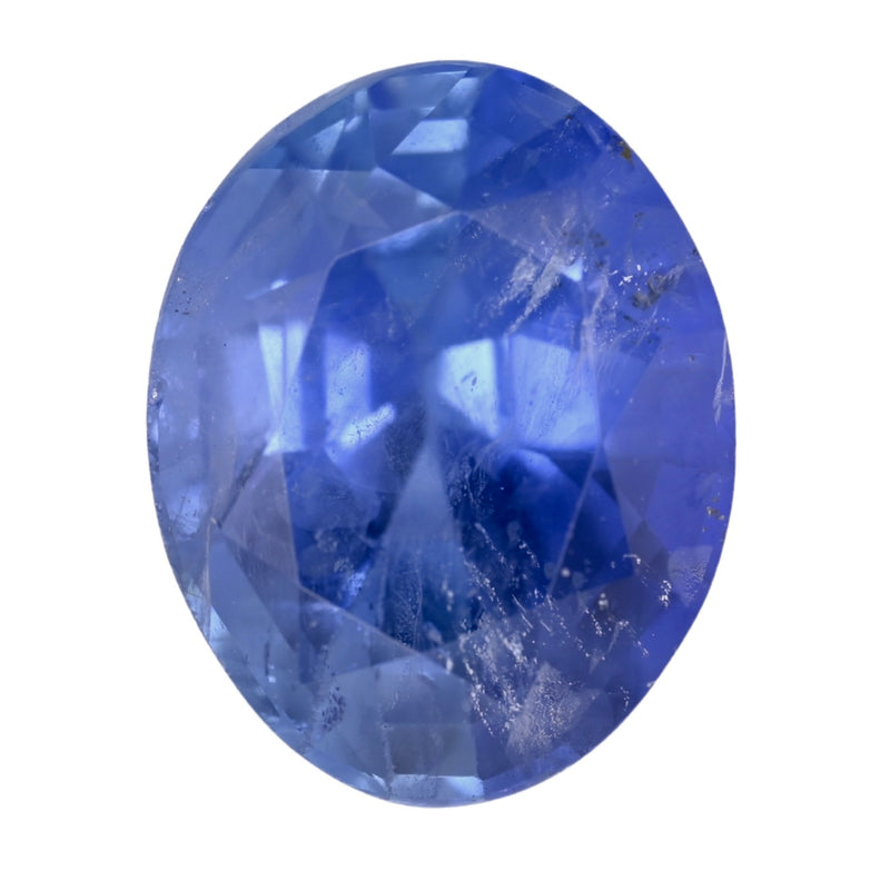 Oval blue sapphire gemstone with faceted surface