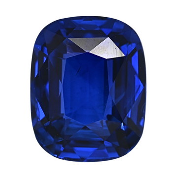 Cushion-cut blue sapphire gemstone with bright faceted surface