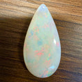 White opal pear-shaped cabochon with rainbow iridescence