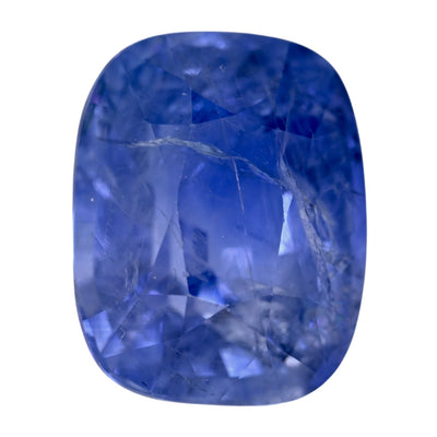 Cushion-cut blue sapphire gemstone, vivid faceted surface