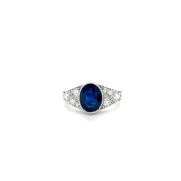 14k white gold sapphire and diamond ring with oval blue center stone