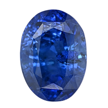 Oval blue sapphire gemstone, large faceted stone with reflective highlights