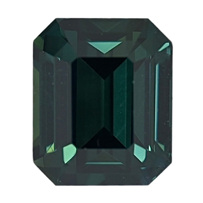 Emerald-cut teal sapphire gemstone, dark green-blue with stepped facets