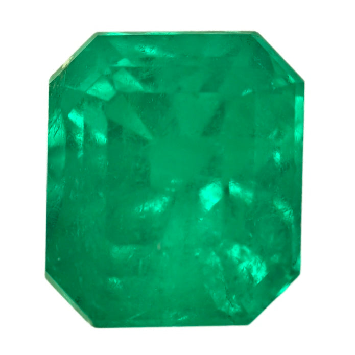 Green emerald gemstone with octagonal step-cut facets, 3.07 carats